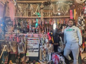 A stall owner stands by his stall at the Mbabane Market. Photo: Adekunle Owolabi